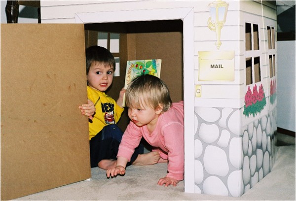 Bobby and Stacia in toy house, 2003